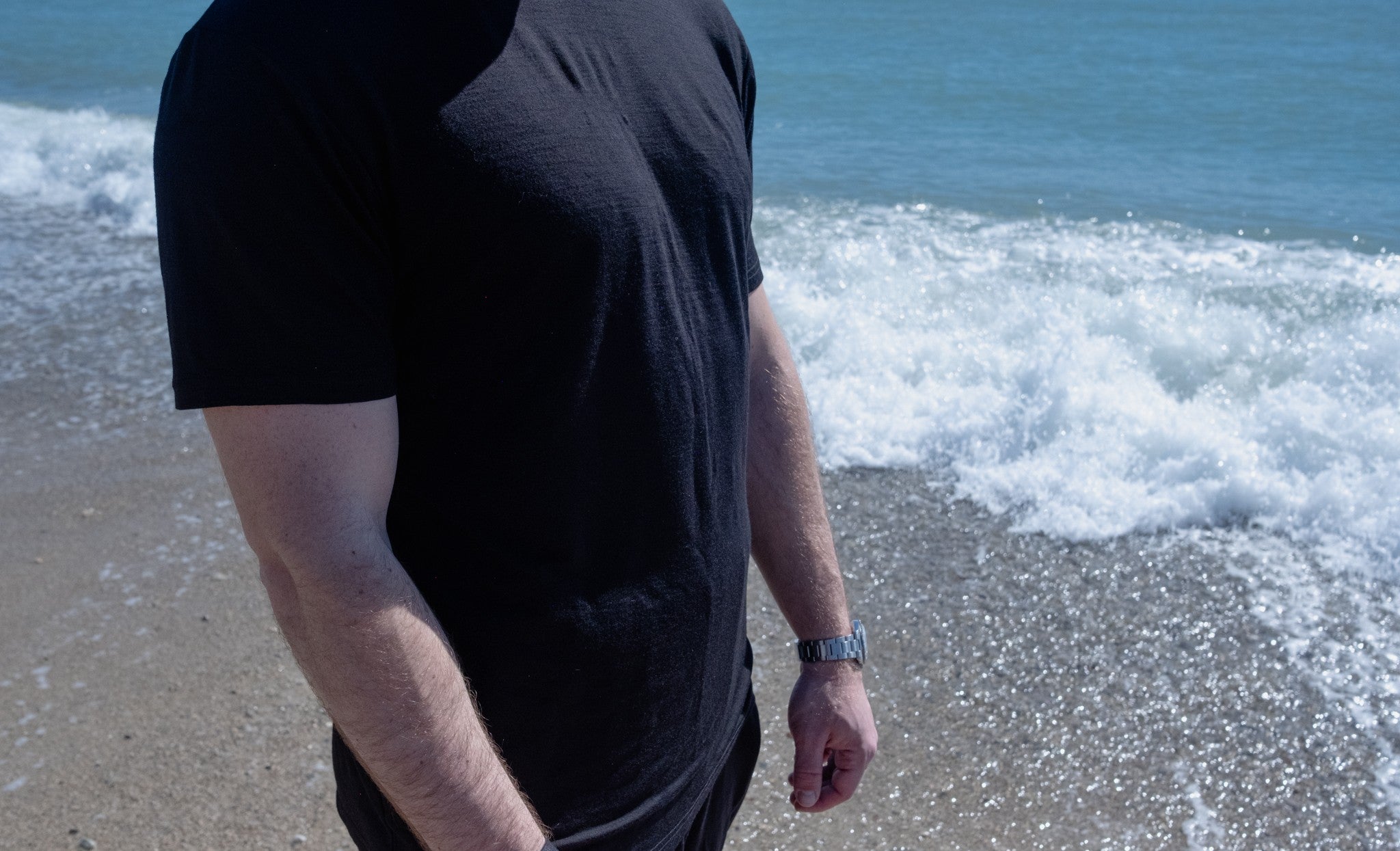 men wearing merino wool activewear on the beach